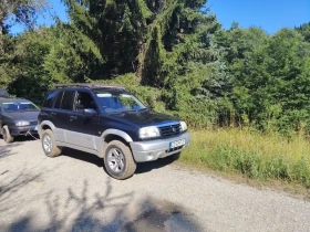 Suzuki Grand vitara 2.0, снимка 11