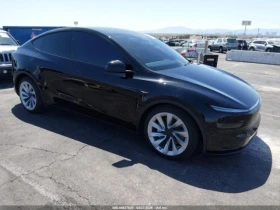 ������ Tesla Model Y