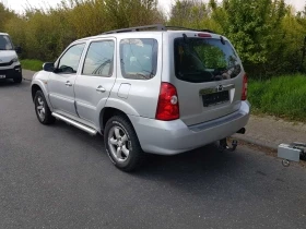 Mazda Tribute 2.0/124-2.3/150, снимка 11