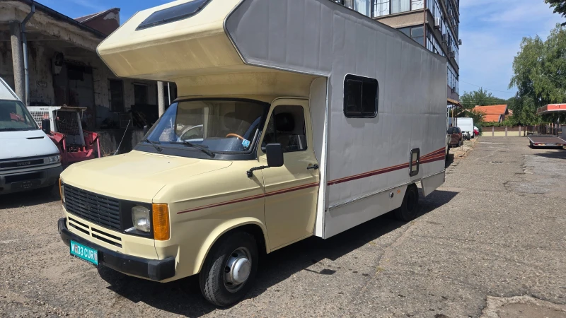 Кемпер Ford Transit, снимка 11 - Каравани и кемпери - 53393557