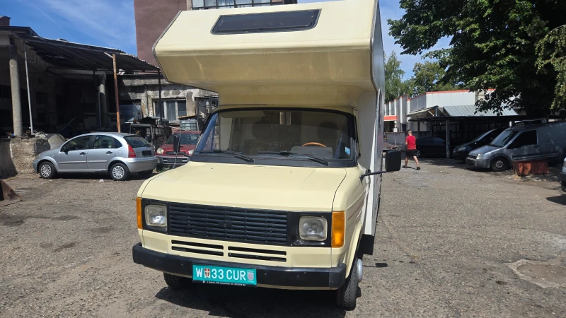 Кемпер Ford Transit, снимка 12 - Каравани и кемпери - 53393557