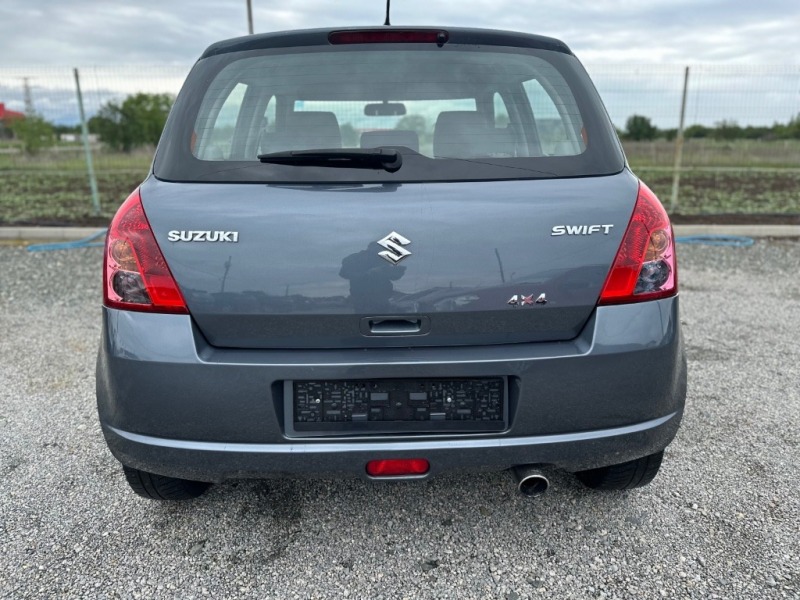 Suzuki Swift 1.3 4X4, снимка 6 - Автомобили и джипове - 45653673