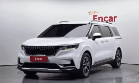 Kia Carnival ГАЗ+ БЕНЗИН* КОЖА* ПОДГРЕВ* ОБДУХВ* МОНИТОРИ* ДИСТ, снимка 1