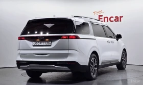 Kia Carnival ГАЗ+ БЕНЗИН* КОЖА* ПОДГРЕВ* ОБДУХВ* МОНИТОРИ* ДИСТ, снимка 5