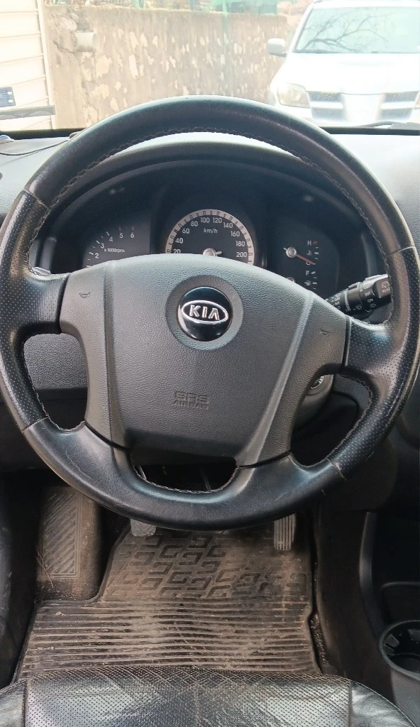 Kia Sportage, снимка 11 - Автомобили и джипове - 49560690