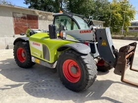       Claas Scorpion 7045