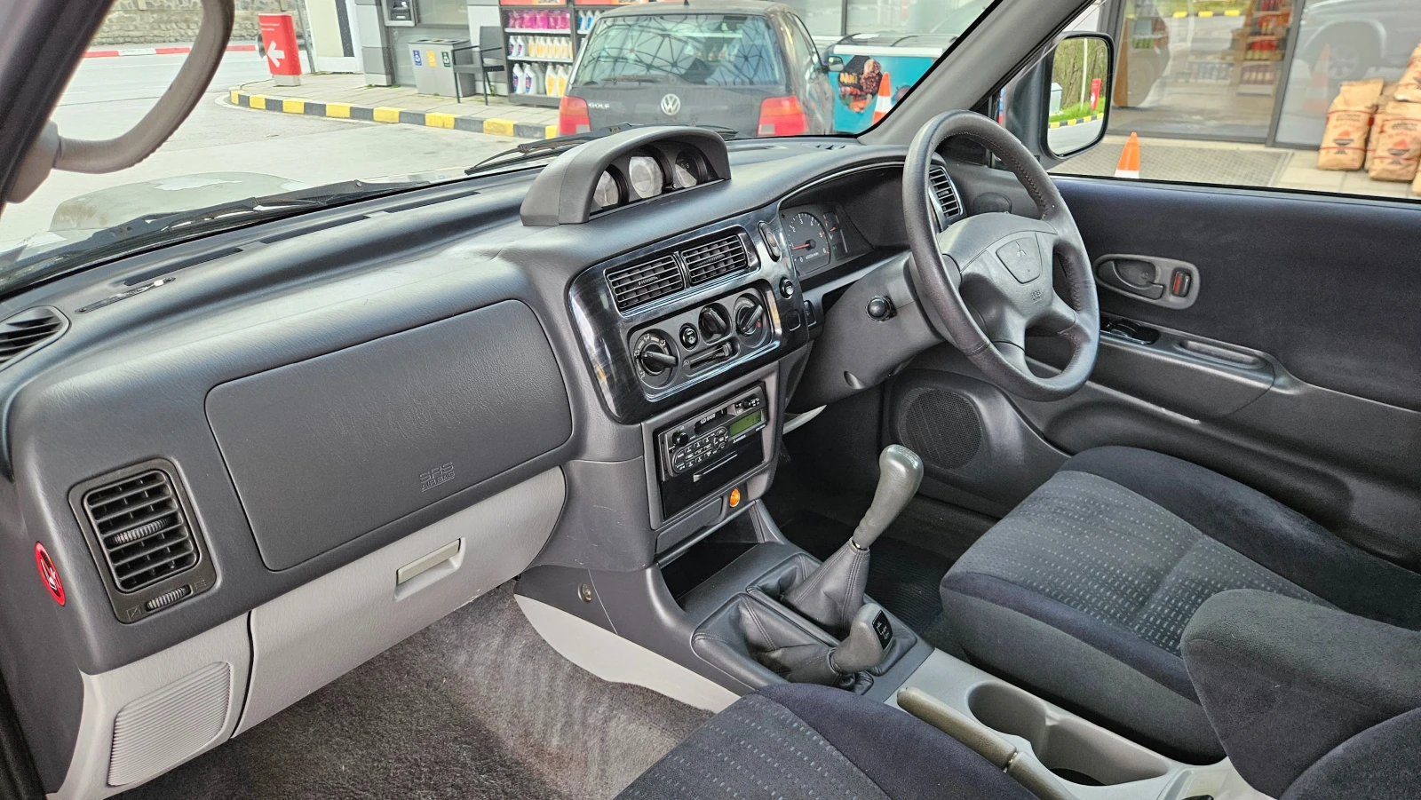 Mitsubishi Pajero sport 2.5 Tdi FACELIFT/KLIMATIK , снимка 11 - Автомобили и джипове - 54184472
