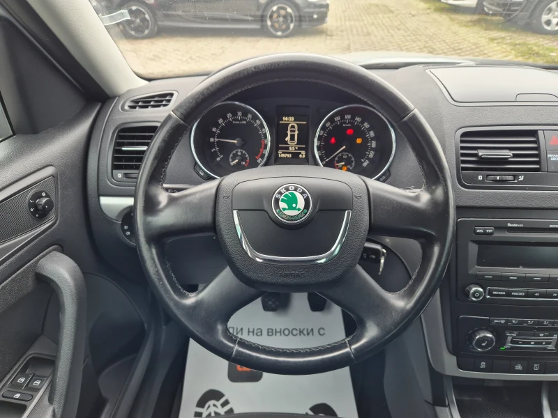 Skoda Yeti 2.0 TDI-110k.s.4x4, снимка 10 - Автомобили и джипове - 53415300