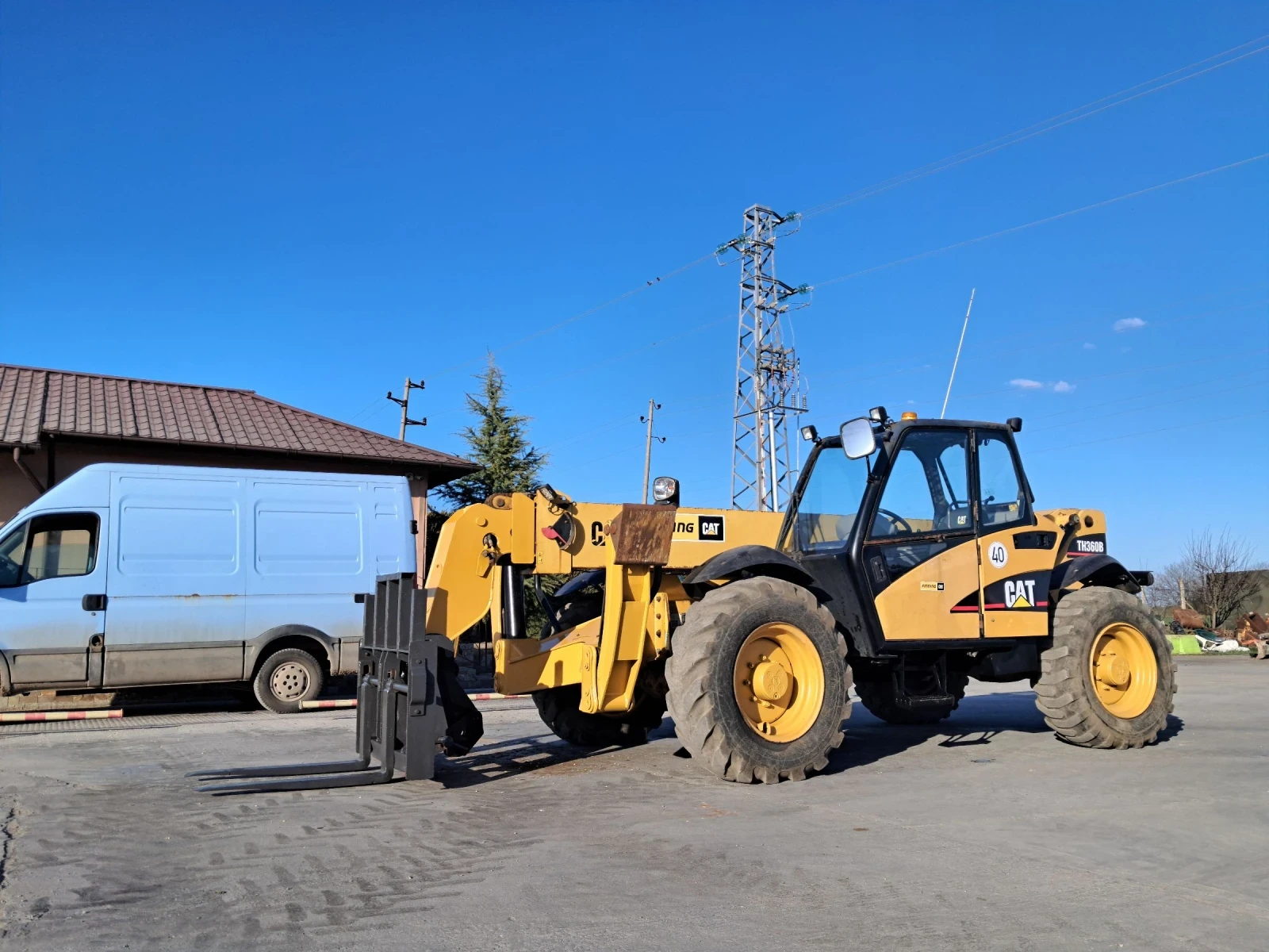 Телескопичен товарач Caterpillar ТН360В