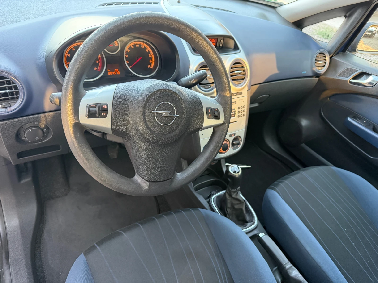 Opel Corsa 1.4 i 90 ks, снимка 9 - Автомобили и джипове - 56205580