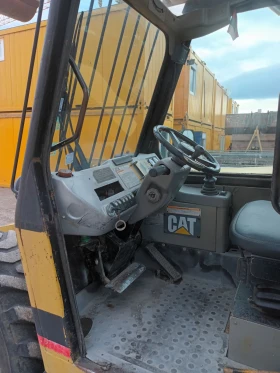 Телескопични товарачи Caterpillar TH 63, снимка 4