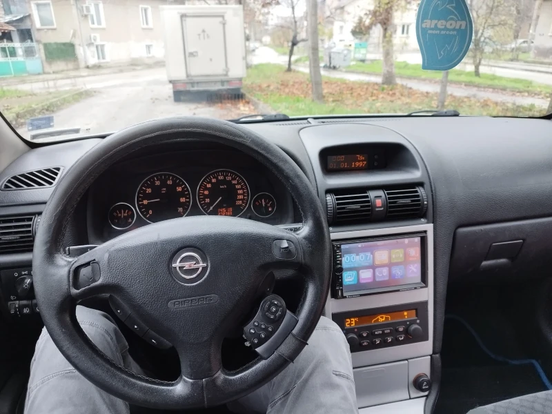 Opel Astra, снимка 7 - Автомобили и джипове - 52592284