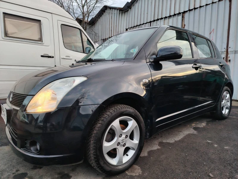 Suzuki Swift 1.3. 4x4, снимка 7 - Автомобили и джипове - 53105674