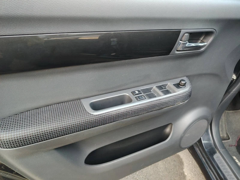 Suzuki Swift 1.3. 4x4, снимка 10 - Автомобили и джипове - 53105674