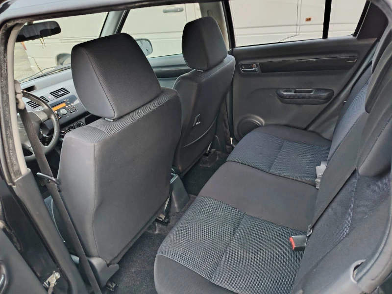 Suzuki Swift 1.3. 4x4, снимка 5 - Автомобили и джипове - 53105674