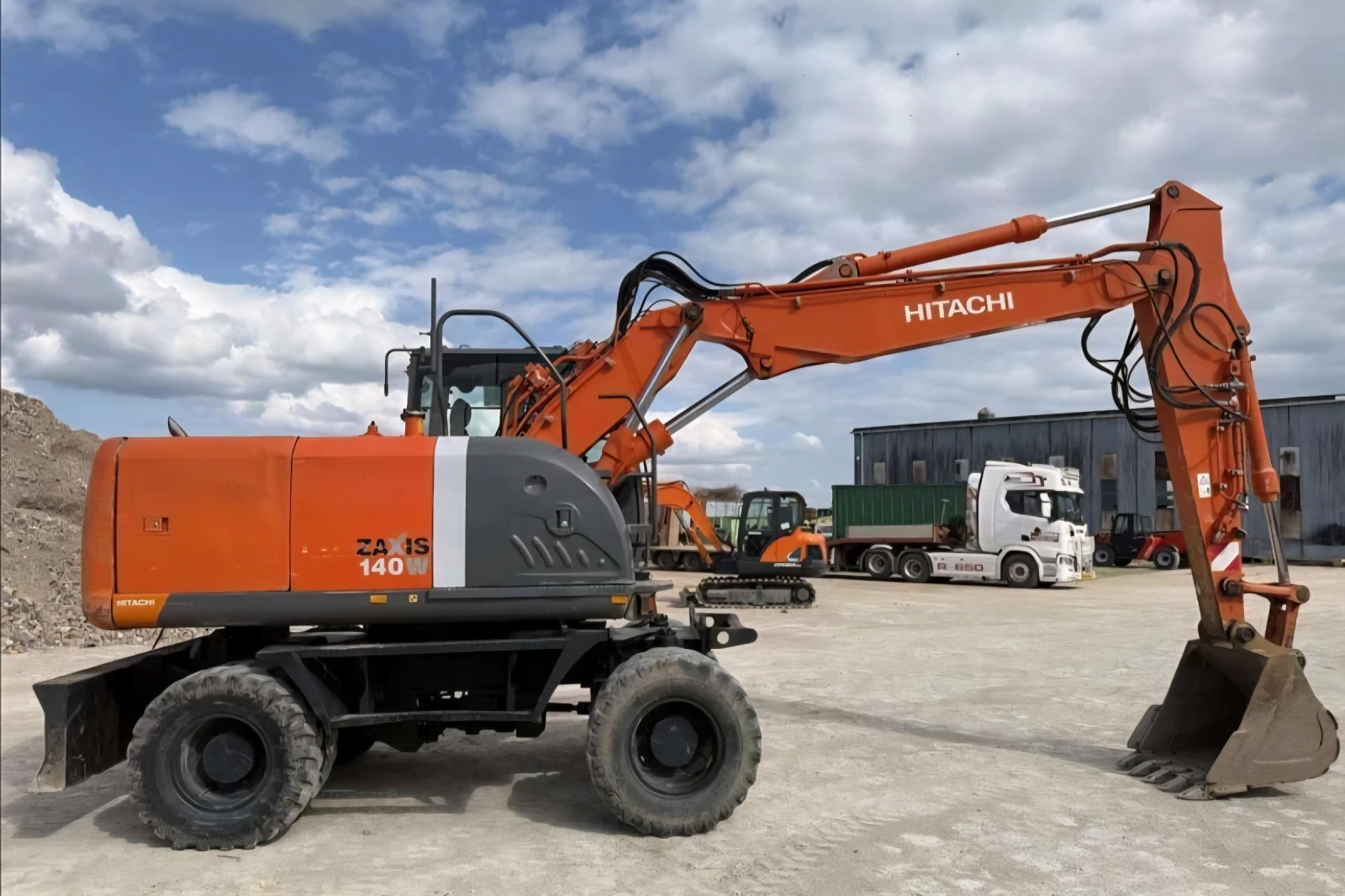Багер Hitachi ZX140W-3