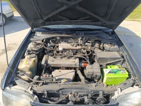 Toyota Carina 1.6 XLi ГАЗ/БЕНЗИН , снимка 8