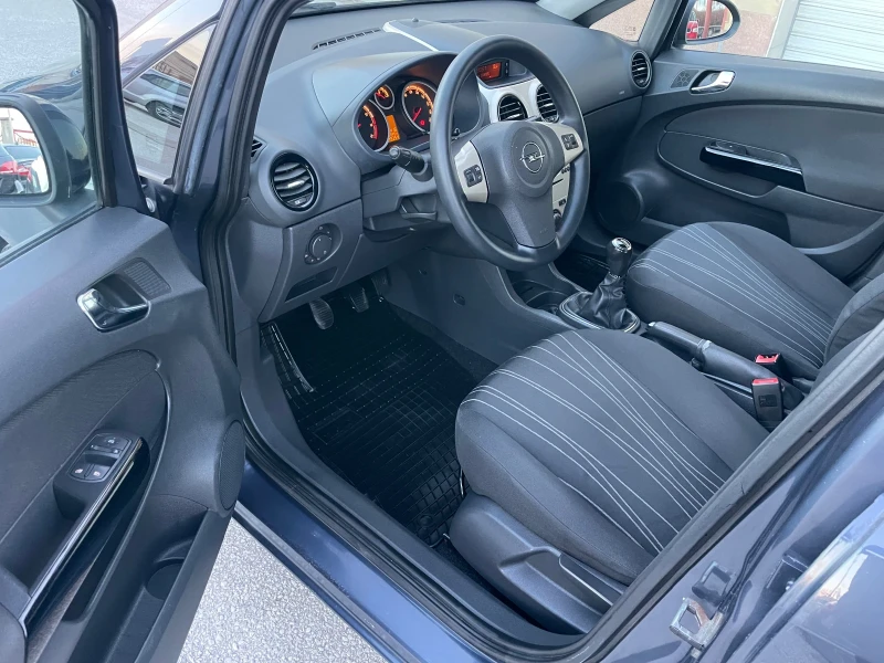 Opel Corsa 1.2i 80к.с. КЛИМА ГЕРМАНИЯ, снимка 11 - Автомобили и джипове - 48657456