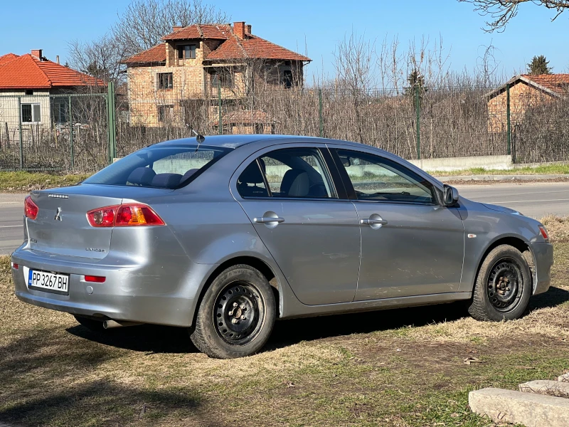 Mitsubishi Lancer 1.5i, снимка 5 - Автомобили и джипове - 48864096