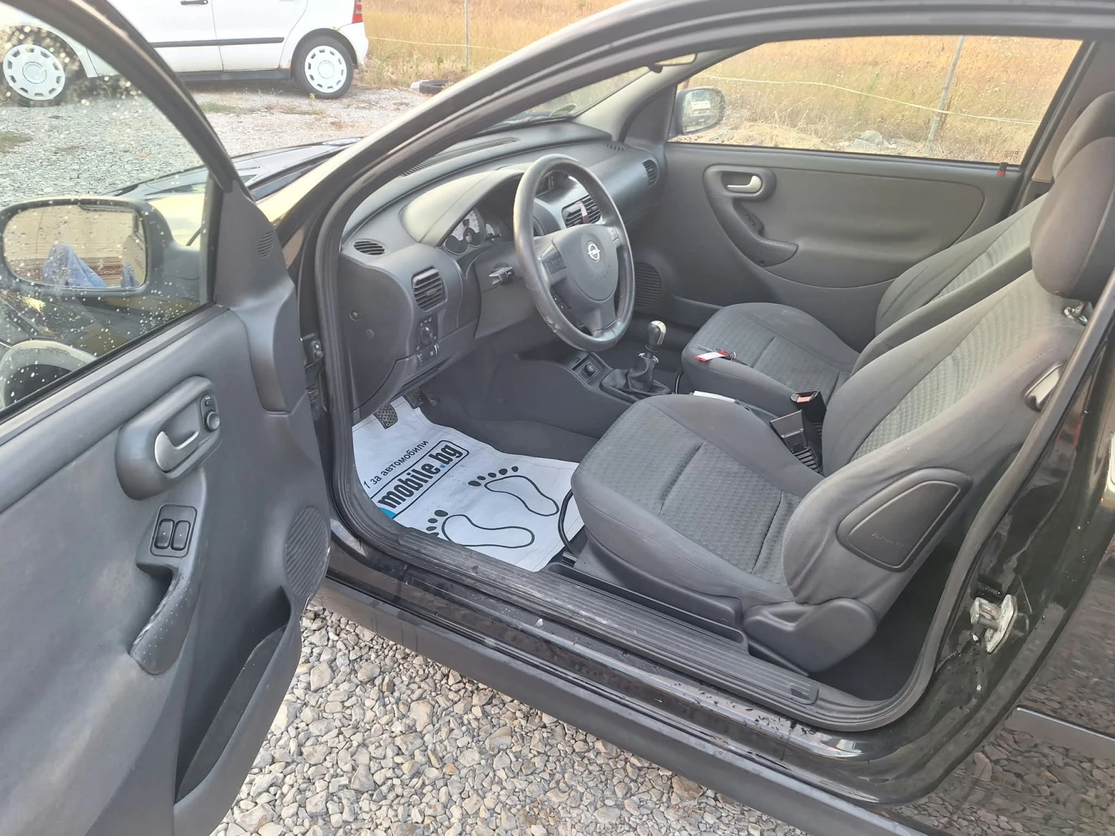 Opel Corsa 1.2i , снимка 15 - Автомобили и джипове - 56233931