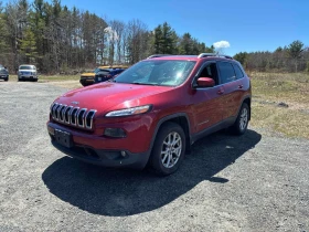 ������ Jeep Cherokee