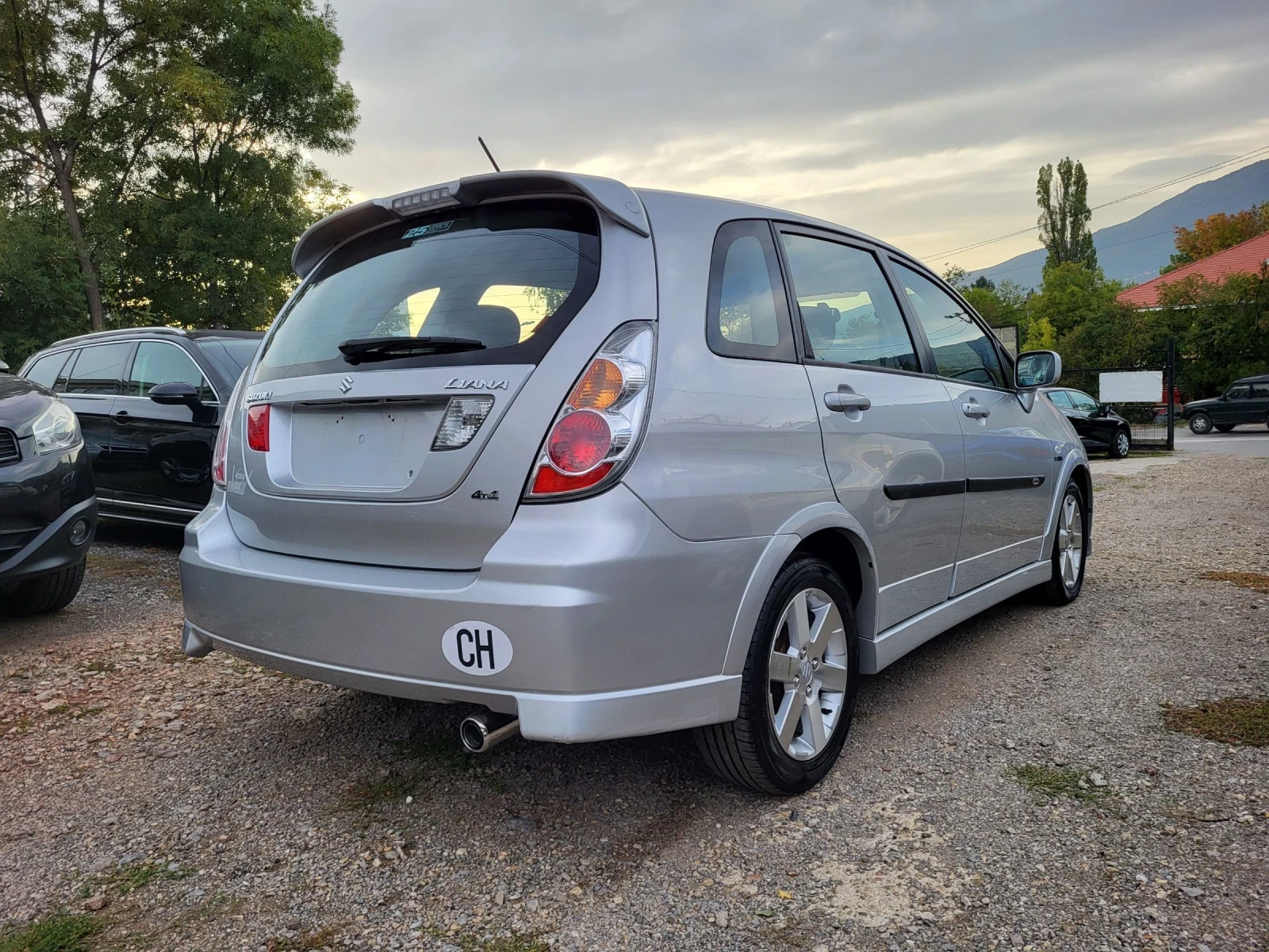 Suzuki Liana 1.6i /4WD / Edition / 72000км. - изображение 6