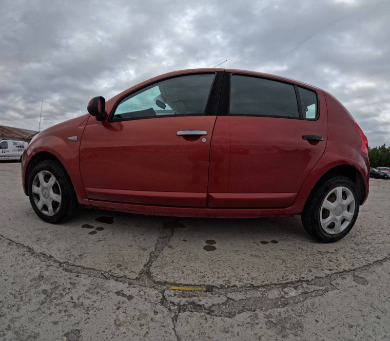 Dacia Sandero 1.6 Бензин/Газ с климатик, снимка 4 - Автомобили и джипове - 51035852