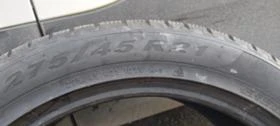 Гуми Зимни 295/35R21, снимка 13