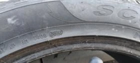 Гуми Зимни 295/35R21, снимка 11