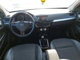 Opel Astra, снимка 14 - Автомобили и джипове - 44418920