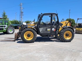 Телескопичен товарач Caterpillar TH 407 2009, снимка 1