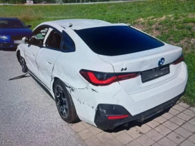 ������ BMW i4