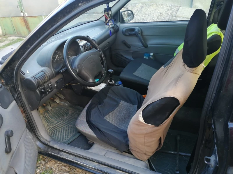 Opel Corsa, снимка 8 - Автомобили и джипове - 52401115