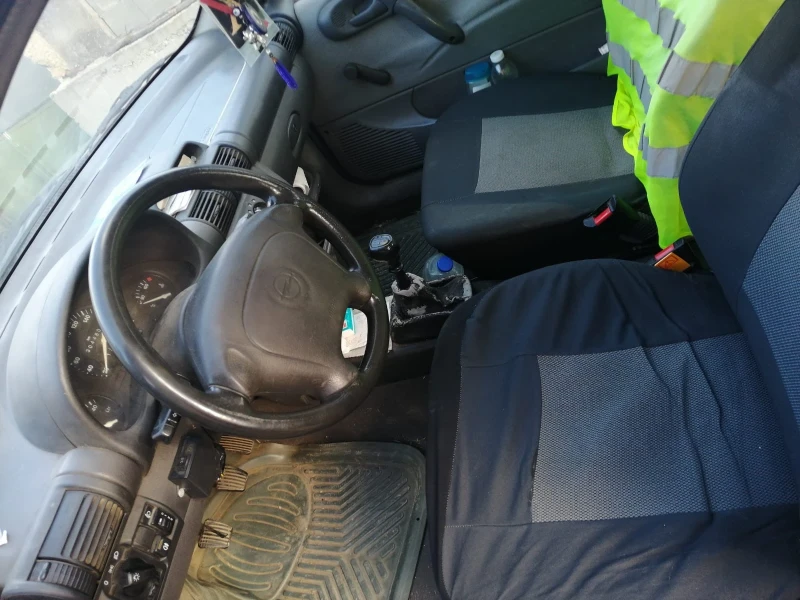 Opel Corsa, снимка 12 - Автомобили и джипове - 52401115