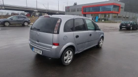 Opel Meriva 1.4 90кс КЛИМА - 1690 € / 3305.35 лв. - 32466195 3