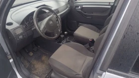 Opel Meriva 1.4 90кс КЛИМА - 1690 € / 3305.35 лв. - 32466195 5