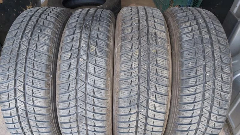 Гуми Зимни 165/65R14, снимка 1 - Гуми и джанти - 29253499