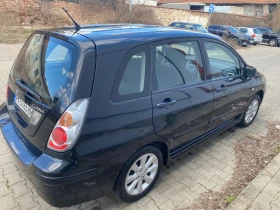 Suzuki Liana, снимка 5 - Автомобили и джипове - 53690103
