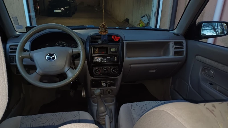 Mazda Demio, снимка 12 - Автомобили и джипове - 47815922