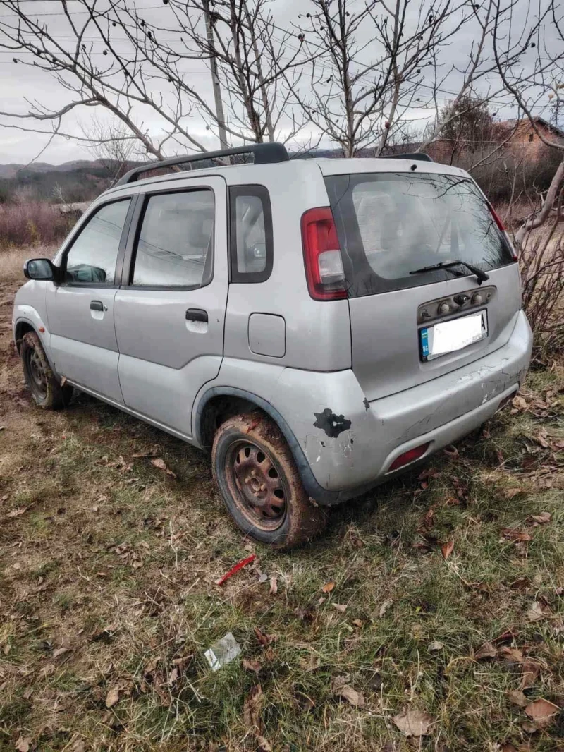 Suzuki Ignis 1.3 4х4, снимка 4 - Автомобили и джипове - 48178496