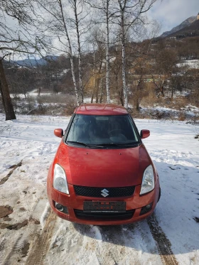 Suzuki Swift 1.3I 4x4 90к.с., снимка 15