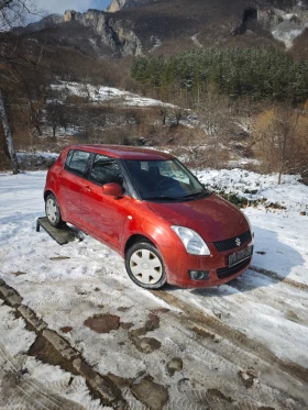 Suzuki Swift 1.3I 4x4 90к.с., снимка 14