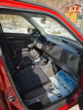 Suzuki Swift 1.3I 4x4 90к.с., снимка 10