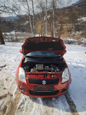 Suzuki Swift 1.3I 4x4 90к.с., снимка 16