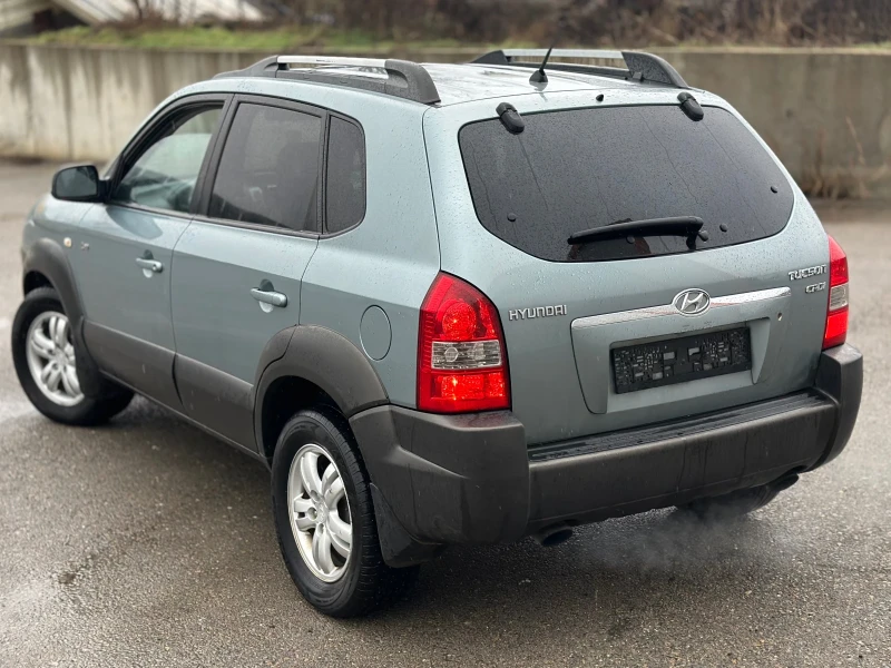Hyundai Tucson 2.0 CRDI / 4X4 / ИТАЛИЯ / БЕЗ РЪЖДИ, снимка 4 - Автомобили и джипове - 53285115