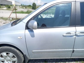 Врата предна лява Киа Карнивал (н)