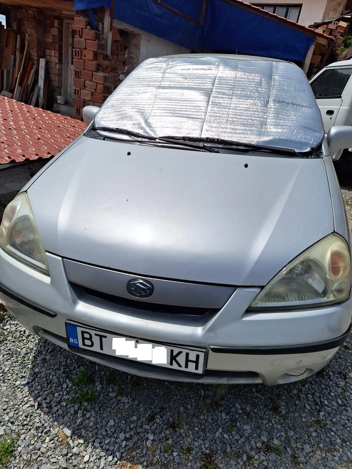 Suzuki Liana, снимка 5 - Автомобили и джипове - 54465935