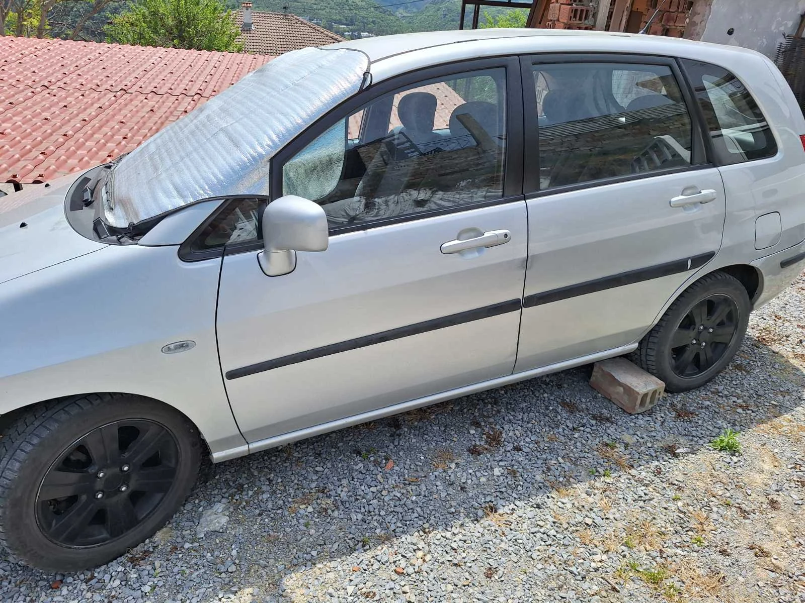 Suzuki Liana, снимка 4 - Автомобили и джипове - 54465935
