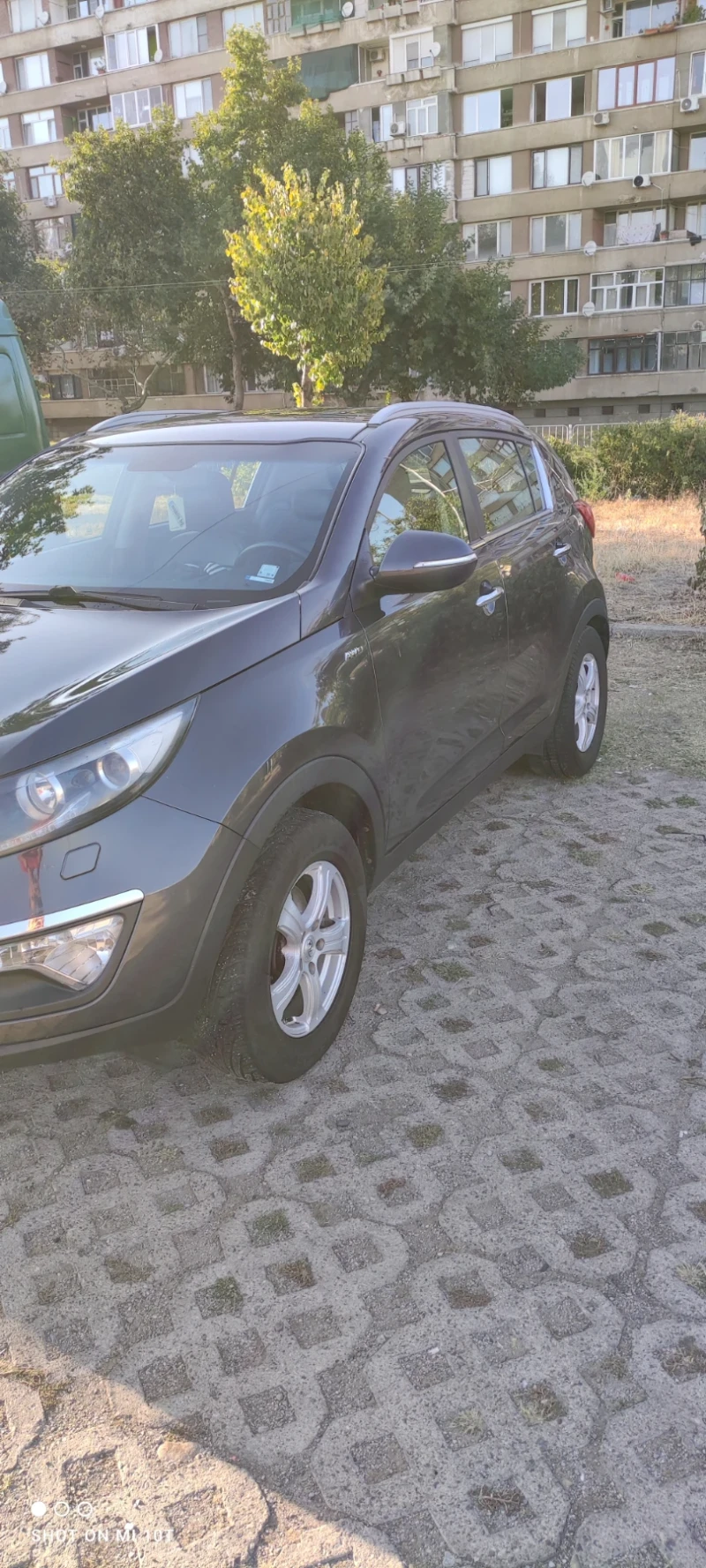 Kia Sportage, снимка 10 - Автомобили и джипове - 47616200