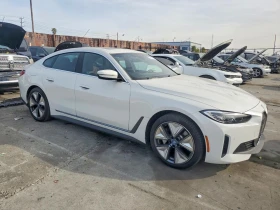 ������ BMW i4